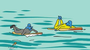 Deux surfeurs rament ensemble